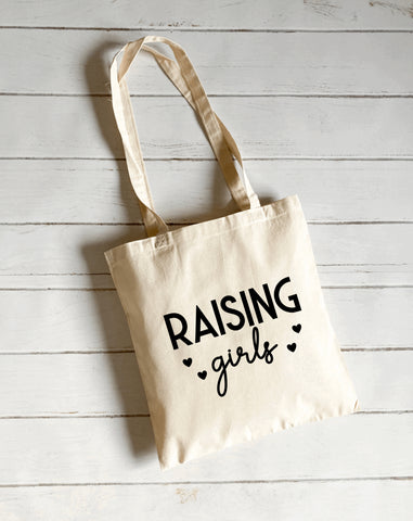 Raising girls canvas tote bag
