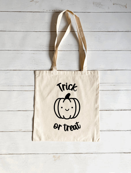 Pumpkin trick or treat canvas tote bag
